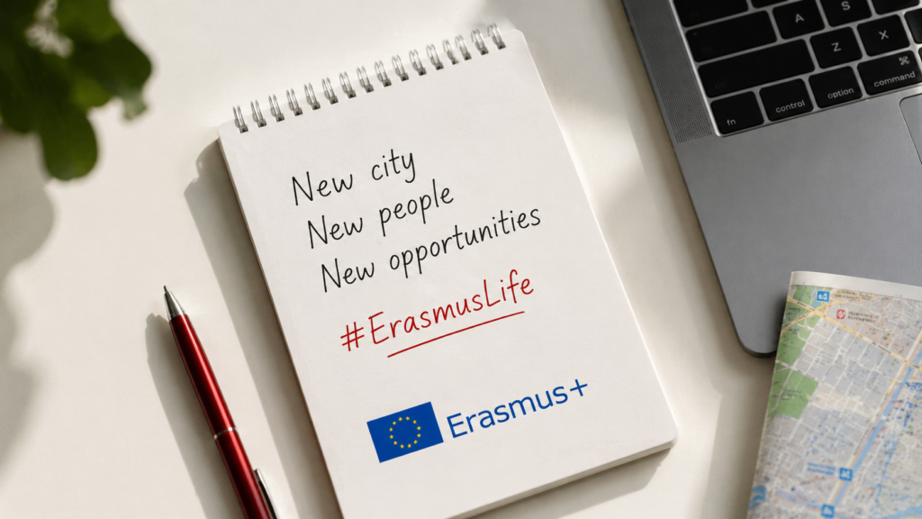 Erasmus planning notebook with laptop, city map and notes about new opportunities